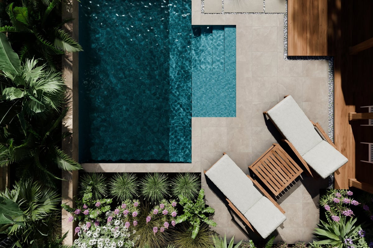Aerial view of luxury swimming pool design and garden landscaping at a private hotel villa resort